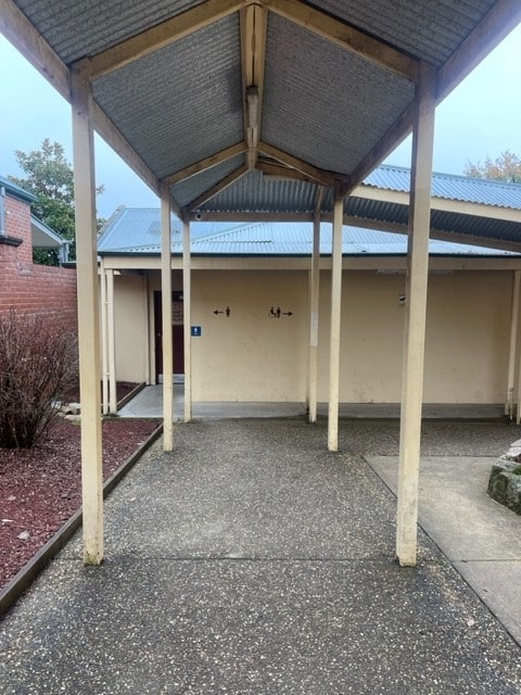 Toilet entry for accessible restrooms on Ford Street