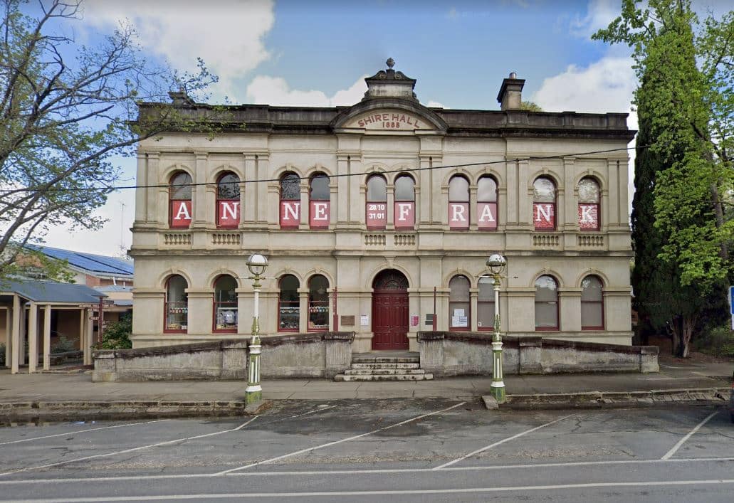 Historic Town Hall Facade with two integrated entry ramps at the front.